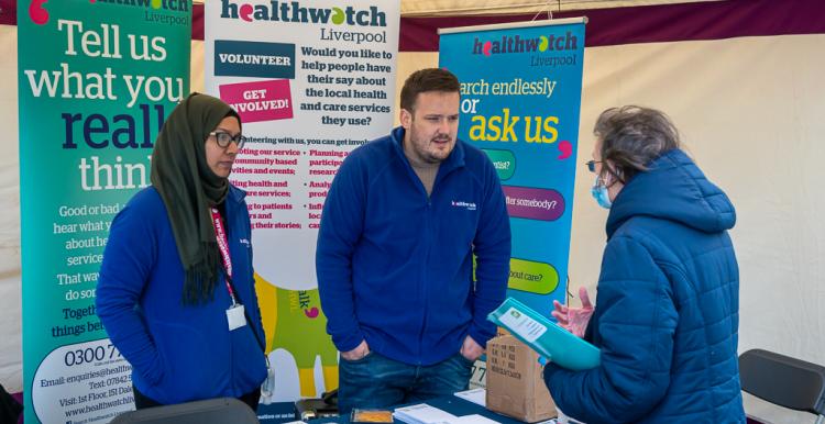 Healthwatch Liverpool staff talking to a member of the public at an event Healthwatch Liverpool staff talking to a member of the public at an event