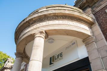 Photo of exterior of Life Rooms Walton building